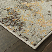 8' X 10' Grey And Gold Abstract Power Loom Stain Resistant Area Rug