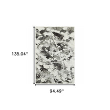 8' X 10' Charcoal And White Abstract Power Loom Stain Resistant Area Rug