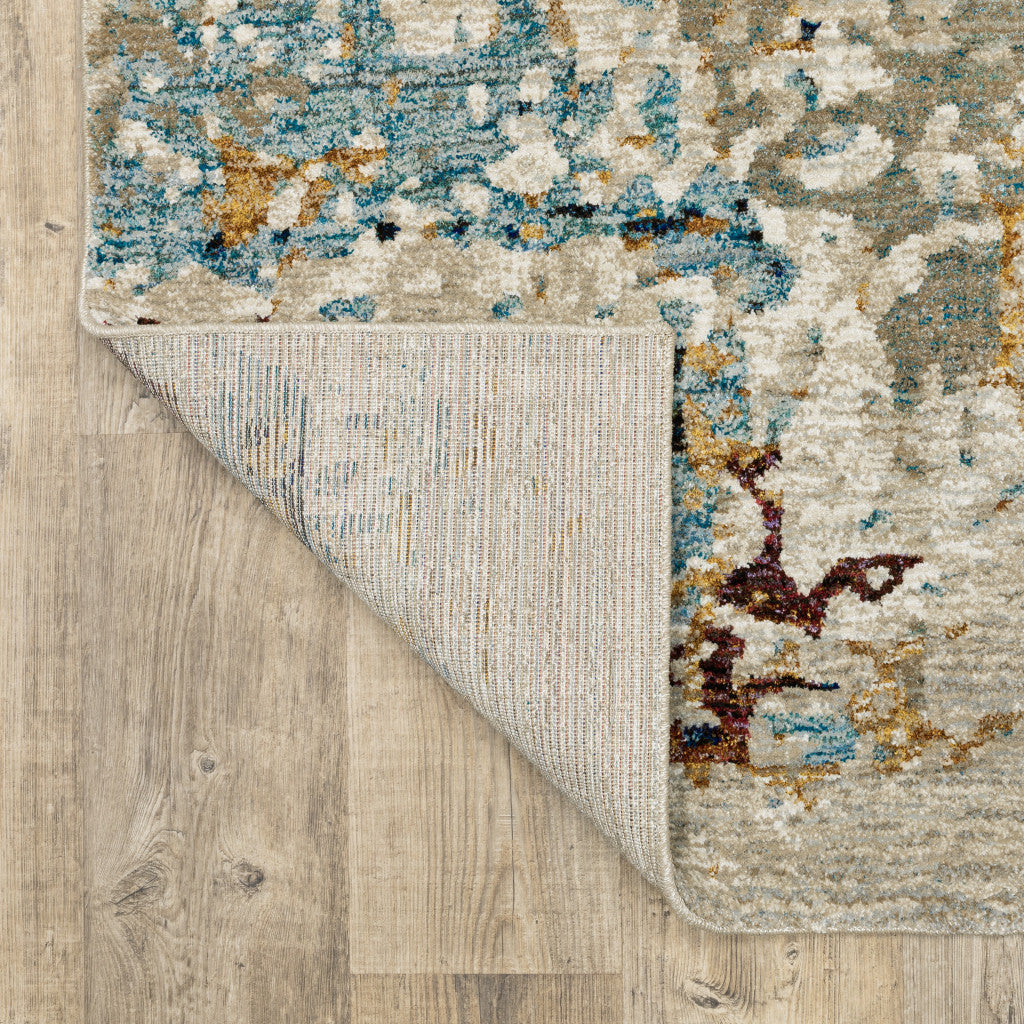 6' X 9' Beige And Blue Abstract Power Loom Stain Resistant Area Rug