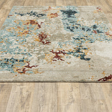 8' X 10' Beige And Blue Abstract Power Loom Stain Resistant Area Rug