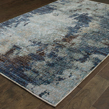 5' X 7' Navy And Blue Abstract Power Loom Stain Resistant Area Rug
