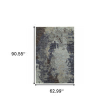 5' X 7' Navy And Blue Abstract Power Loom Stain Resistant Area Rug