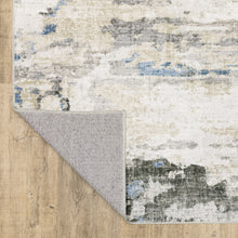 4' X 6' Gray And Ivory Abstract Printed Stain Resistant Non Skid Area Rug