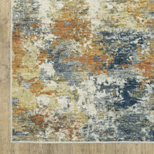 5' X 7' Teal Blue Orange Gold Grey Tan Brown And Beige Abstract Printed Stain Resistant Non Skid Area Rug