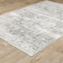 5' X 7' Sage Green Grey Ivory And Silver Oriental Printed Stain Resistant Non Skid Area Rug