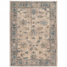 6' X 9' Ivory Blue Gold And Grey Oriental Power Loom Stain Resistant Area Rug