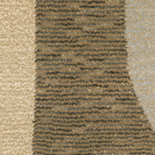 5' X 7' Brown And Ivory Geometric Power Loom Area Rug