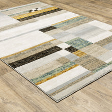 7' X 10' Beige Gold Black Grey Tan Teal And Rust Geometric Power Loom Area Rug