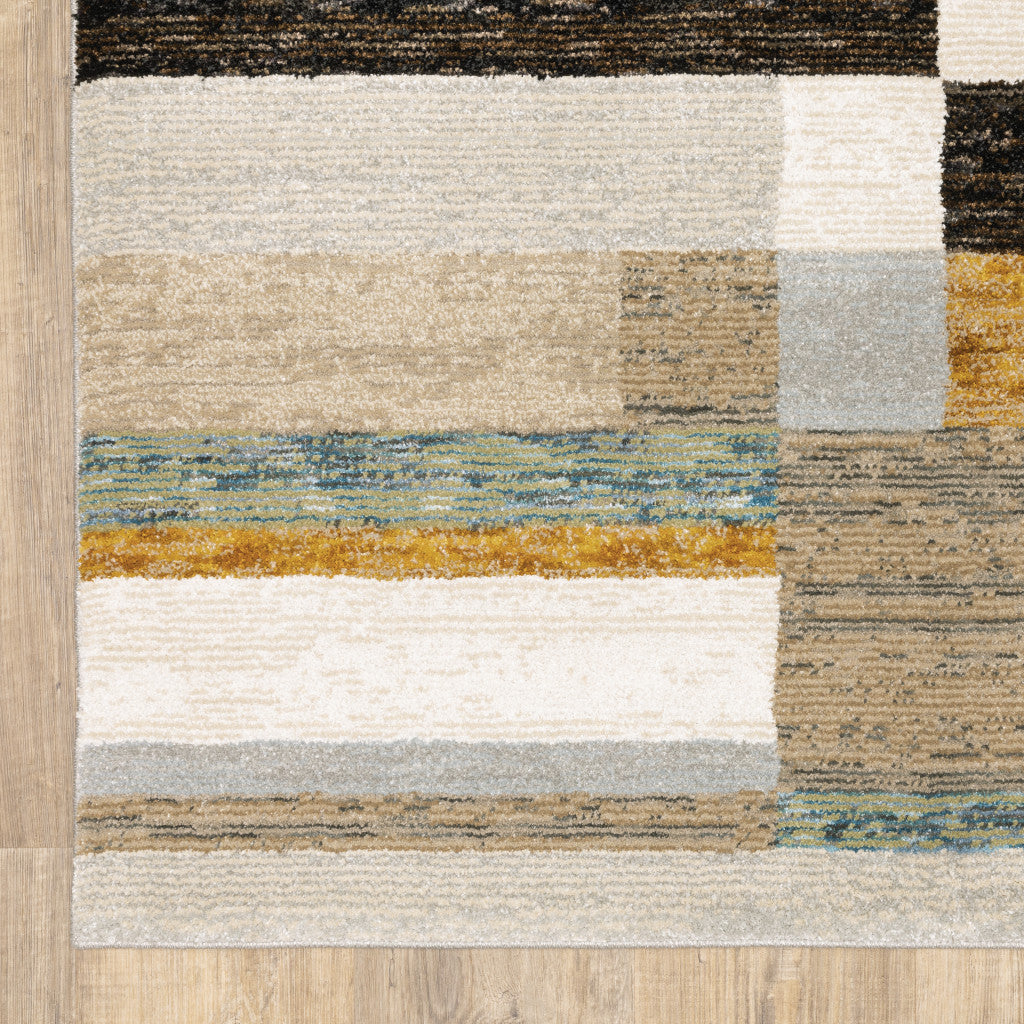 7' X 10' Beige Gold Black Grey Tan Teal And Rust Geometric Power Loom Area Rug