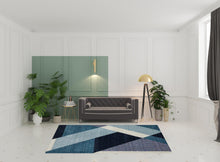 7' X 10' Blue Purple Grey And Teal Geometric Power Loom Area Rug