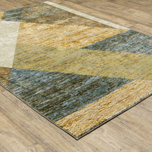6' X 9' Gold Blue Green Rust Beige Purple And Teal Geometric Power Loom Stain Resistant Area Rug