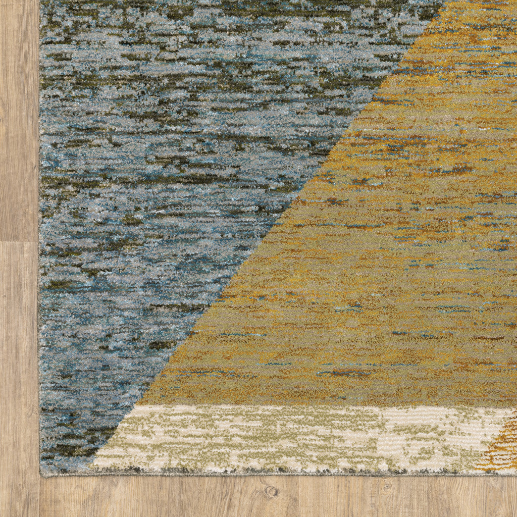 6' X 9' Gold Blue Green Rust Beige Purple And Teal Geometric Power Loom Stain Resistant Area Rug