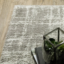 10' X 13' Grey And Ivory Abstract Shag Power Loom Stain Resistant Area Rug