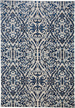 Blue Ivory And Black Floral Distressed Stain Resistant Area Rug - 2' X 4'
