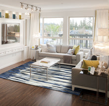 2' X 4' Ivory Blue And Gray Abstract Distressed Area Rug