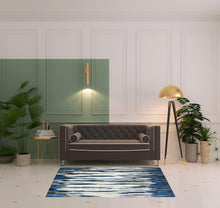 2' X 4' Ivory Blue And Gray Abstract Distressed Area Rug