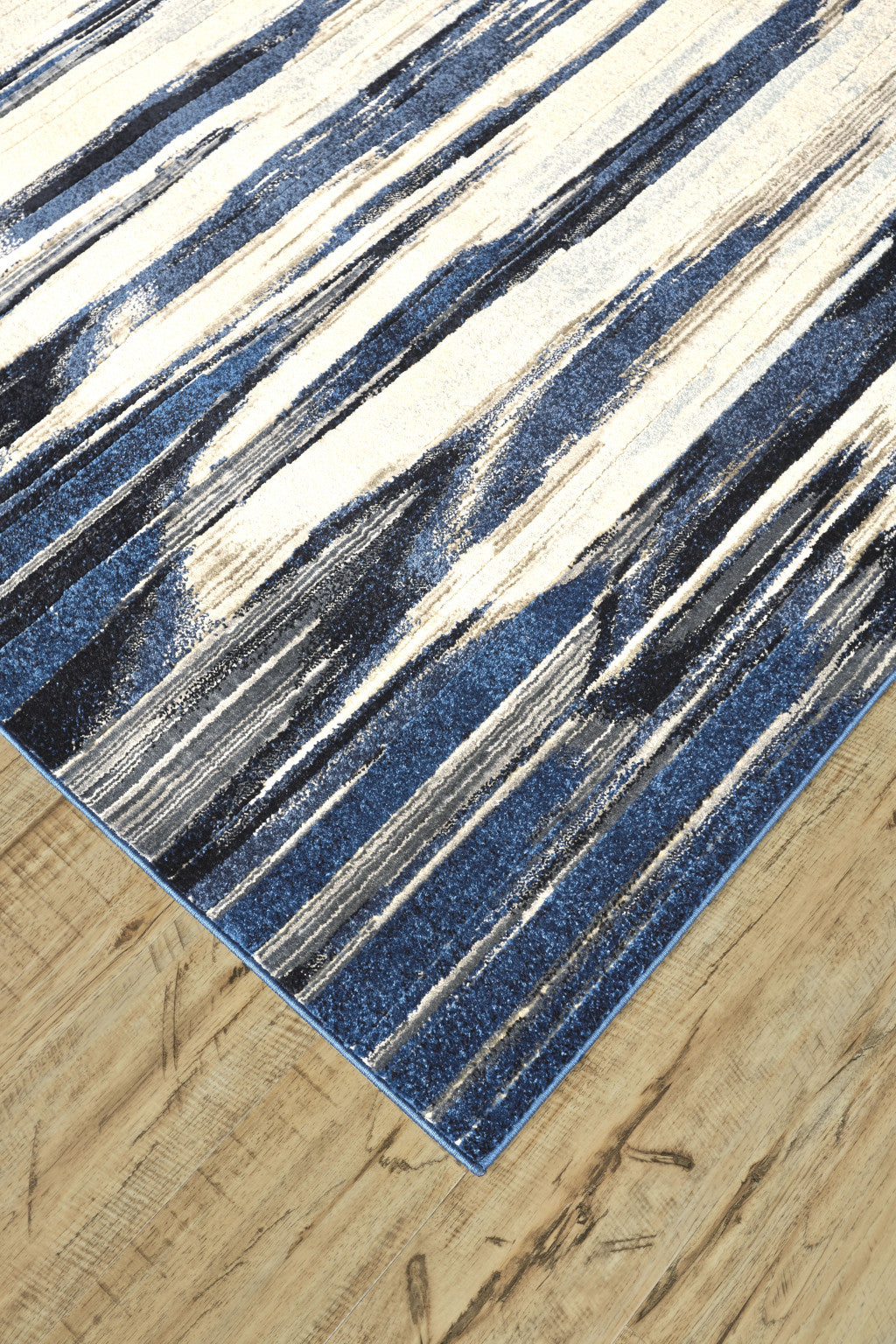 2' X 4' Ivory Blue And Gray Abstract Distressed Area Rug