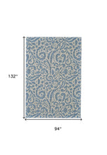 2' X 4' Blue Ivory And Tan Floral Distressed Stain Resistant Area Rug