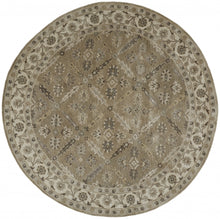 4' X 6' Green Brown And Taupe Wool Paisley Tufted Handmade Stain Resistant Area Rug