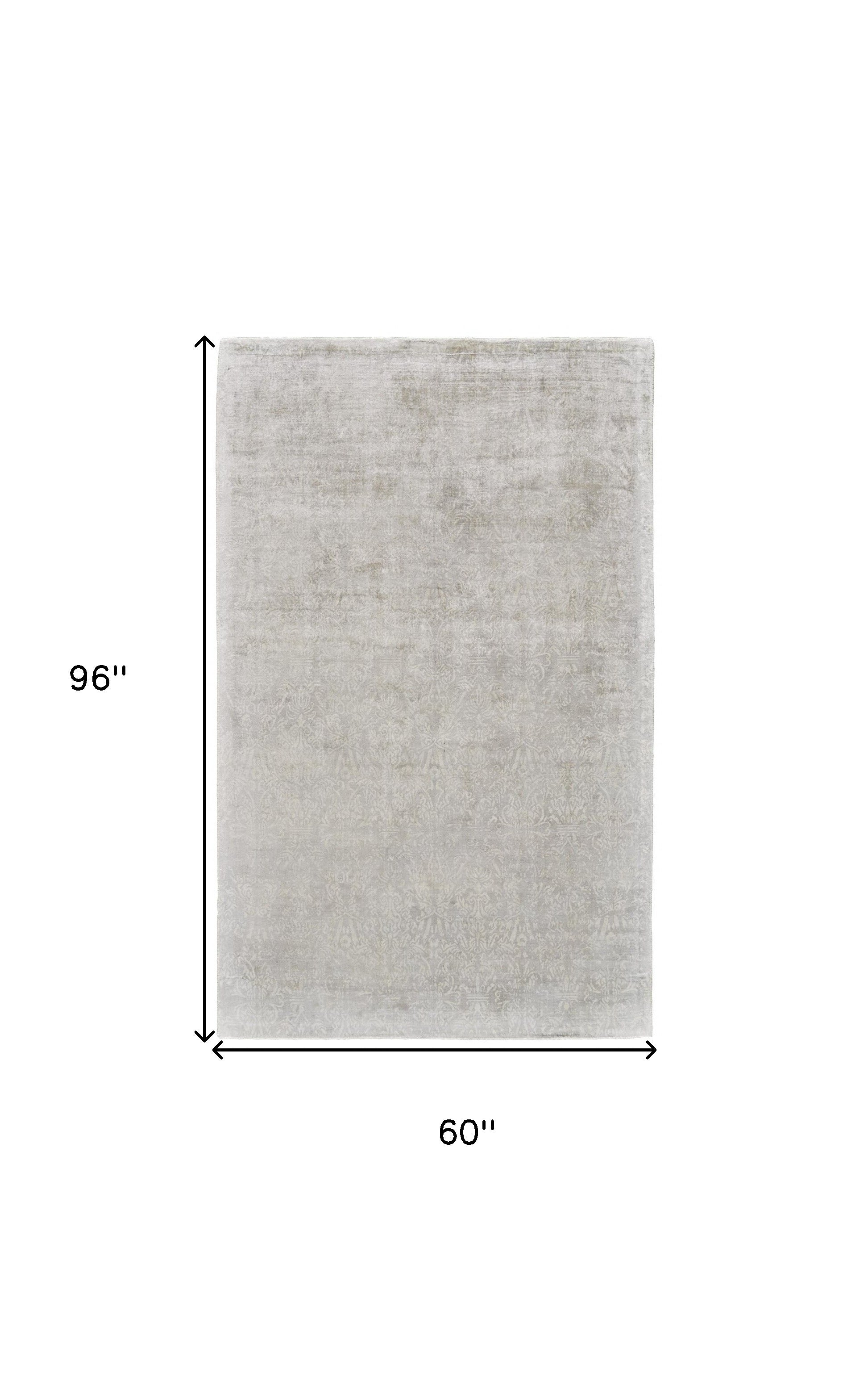5' X 8' Ivory Gray And Tan Abstract Hand Woven Area Rug