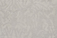 5' X 8' Ivory Gray And Tan Abstract Hand Woven Area Rug