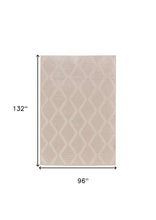5' X 8' Ivory And Tan Geometric Stain Resistant Area Rug