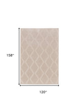 5' X 8' Ivory And Tan Geometric Stain Resistant Area Rug
