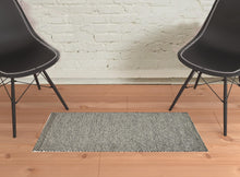 4' X 6' Gray And Ivory Wool Floral Hand Woven Stain Resistant Area Rug