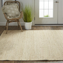 4' X 6' Tan Ivory And Taupe Hand Woven Area Rug