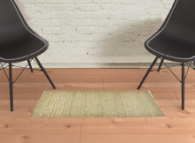 4' X 6' Tan Ivory And Taupe Hand Woven Area Rug