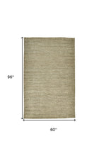 4' X 6' Tan And Gray Hand Woven Area Rug