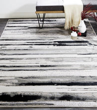 4' X 6' Silver Gray And Black Abstract Area Rug