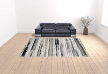 4' X 6' Silver Gray And Black Abstract Area Rug