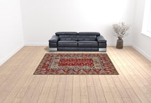 5' X 8' Red Blue And Brown Wool Floral Hand Knotted Distressed Stain Resistant Area Rug With Fringe