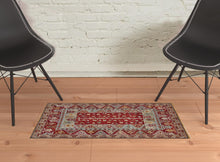 5' X 8' Red Blue And Brown Wool Floral Hand Knotted Distressed Stain Resistant Area Rug With Fringe