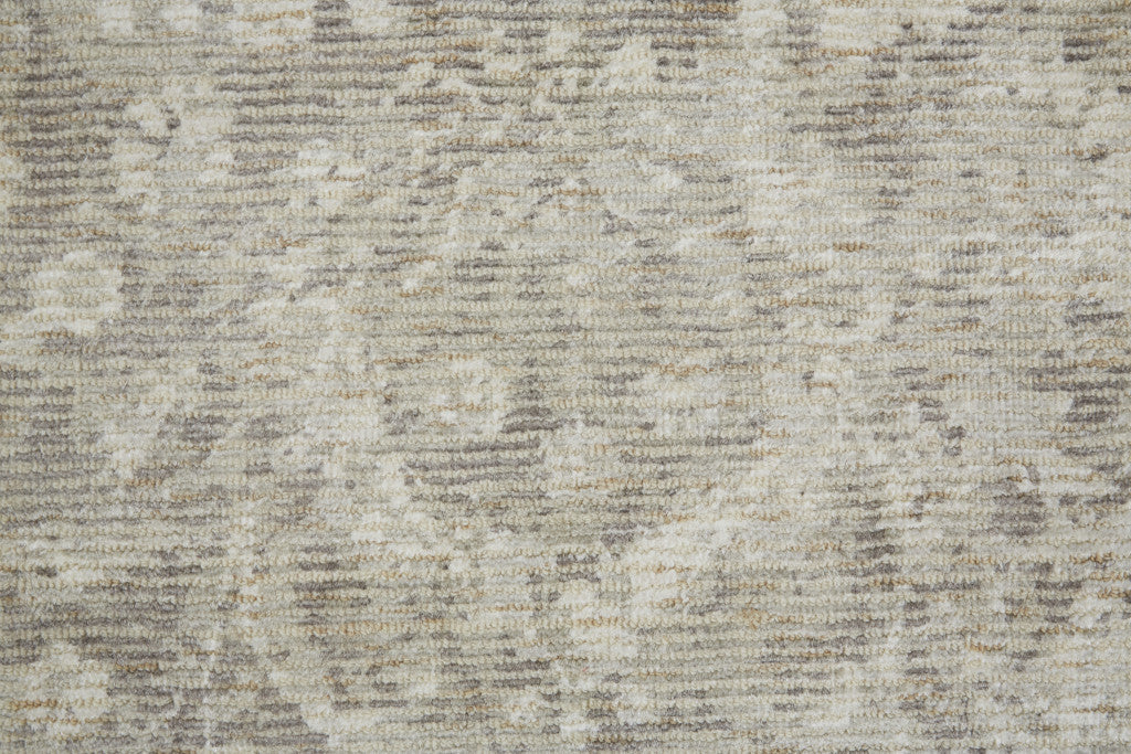 5' X 8' Ivory And Tan Abstract Hand Woven Area Rug