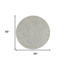 5' X 8' Ivory And Tan Abstract Hand Woven Area Rug