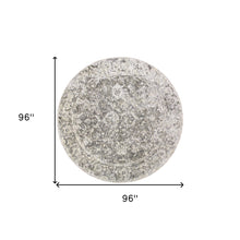 5' X 8' Ivory And Tan Abstract Hand Woven Area Rug