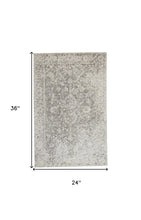 5' X 8' Ivory And Tan Abstract Hand Woven Area Rug