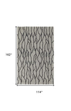 4' X 6' Taupe Black And Gray Wool Abstract Tufted Handmade Stain Resistant Area Rug