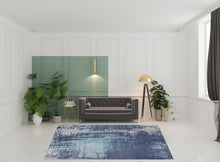 8' X 10' Blue And Ivory Abstract Hand Woven Area Rug