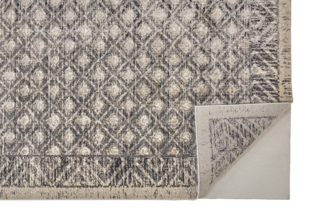 4' X 6' Ivory Black And Taupe Abstract Stain Resistant Area Rug