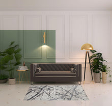 4' X 6' Taupe Gray And Ivory Abstract Stain Resistant Area Rug