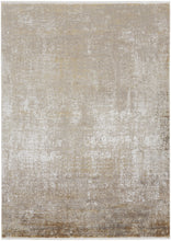 3' X 5' Taupe Ivory And Gold Abstract Power Loom Distressed Area Rug With Fringe