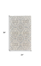 5' X 8' Blue Orange And Ivory Wool Geometric Tufted Handmade Stain Resistant Area Rug