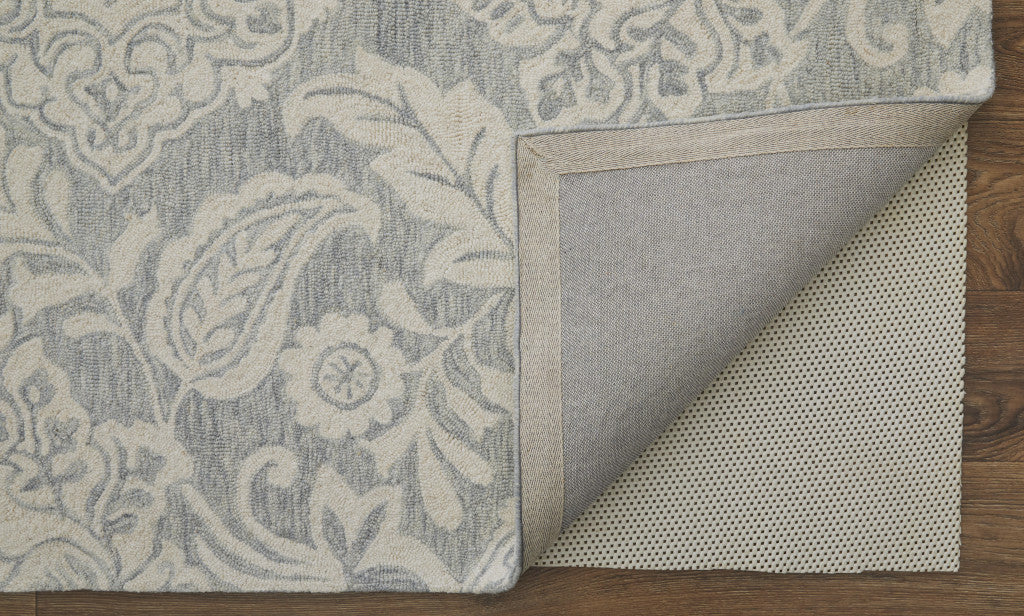 Blue And Ivory Wool Paisley Tufted Handmade Stain Resistant Area Rug - 5' x 8'