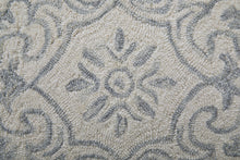 Blue And Ivory Wool Paisley Tufted Handmade Stain Resistant Area Rug - 5' x 8'