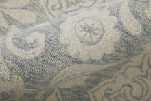 Blue And Ivory Wool Paisley Tufted Handmade Stain Resistant Area Rug - 5' x 8'