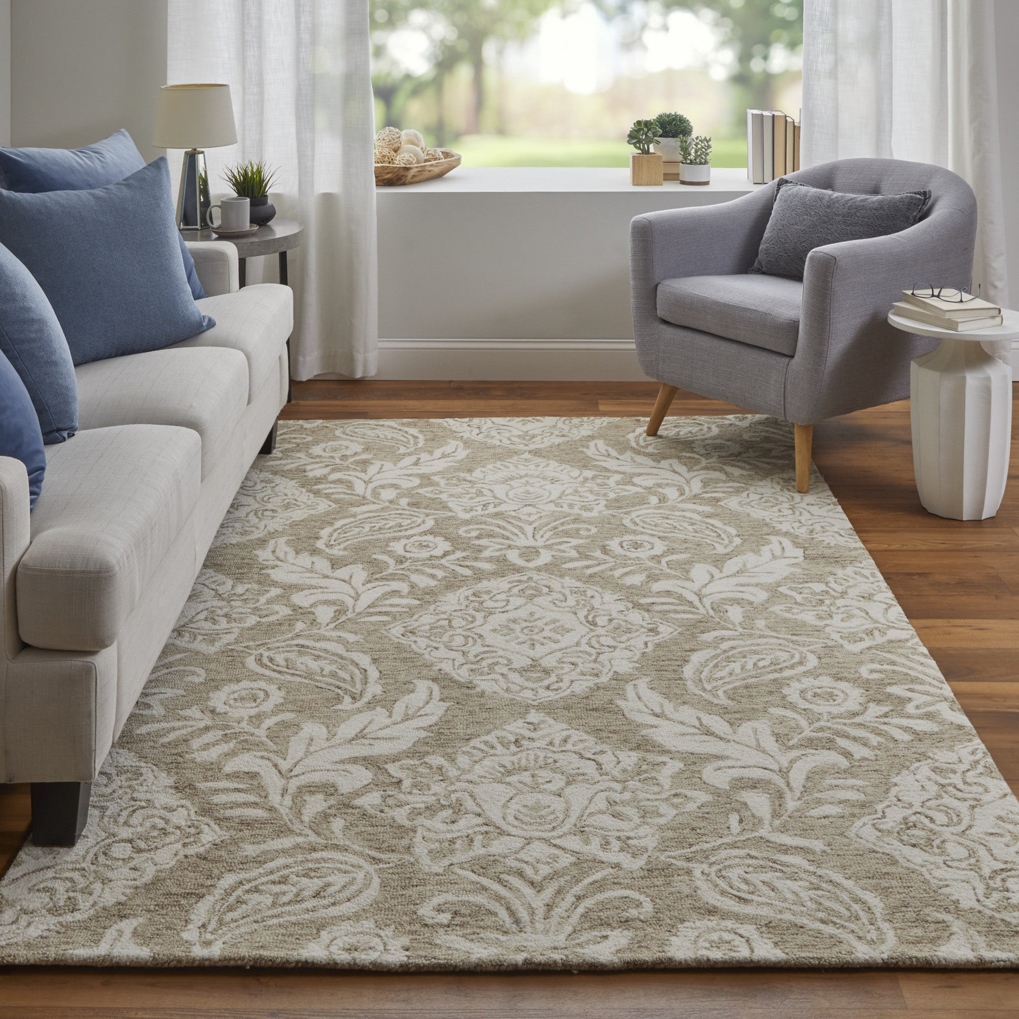 Blue And Ivory Wool Paisley Tufted Handmade Stain Resistant Area Rug - 5' x 8'