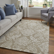 Blue And Ivory Wool Paisley Tufted Handmade Stain Resistant Area Rug - 5' x 8'